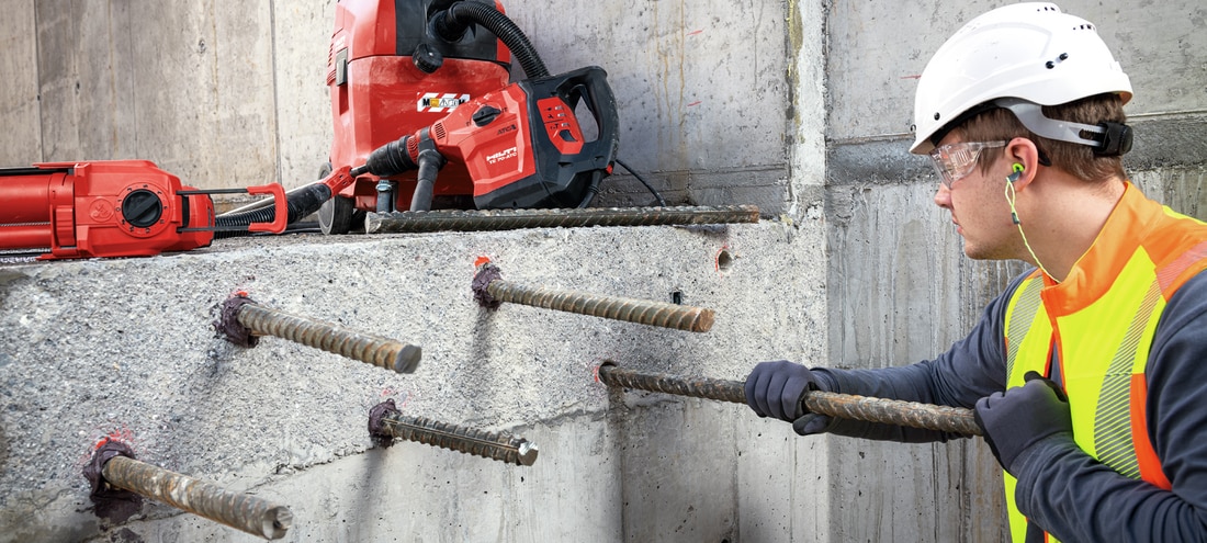 Worker securing rebar