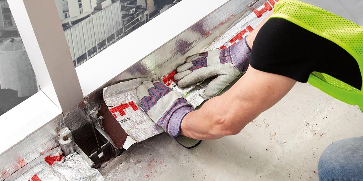 firestop contractor installs quick seal edge of slab firestop on a jobsite